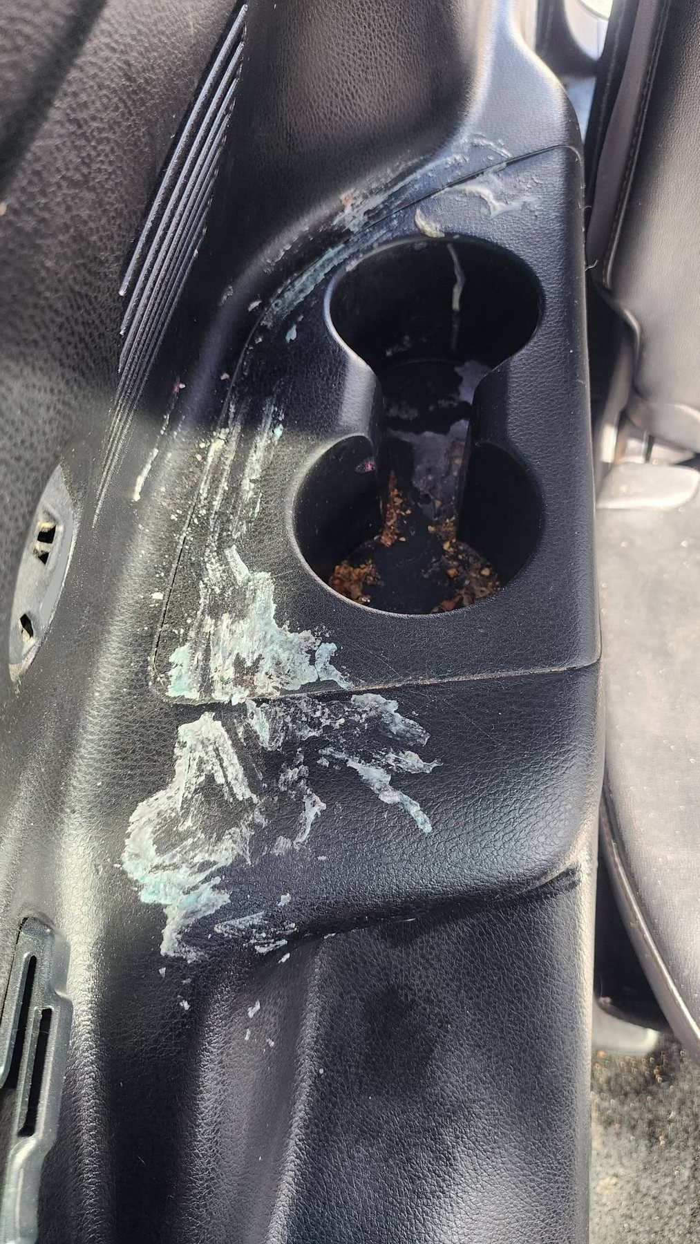 Cupholder before steam cleaning